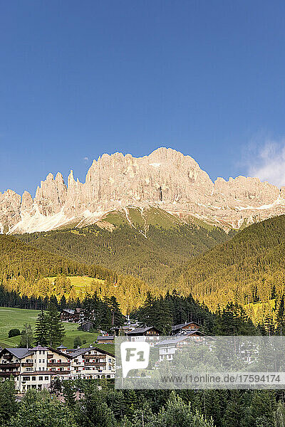 Italy  South Tyrol  Scenic view of Rosengartenspitze and Vajolet Towers in Fassa Valley at early dusk