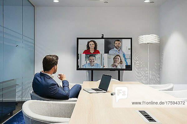 Businessman discussing in web conference at meeting room