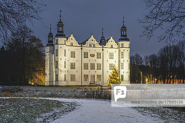 Germany  Schleswig-Holstein  Ahrensburg  Footpath in front of Schloss Ahrensburg at night