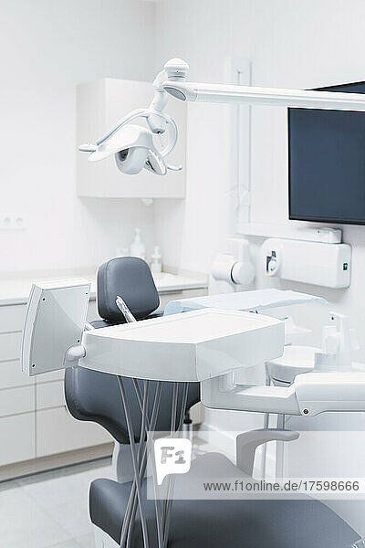 Empty dentist chair at modern medical room
