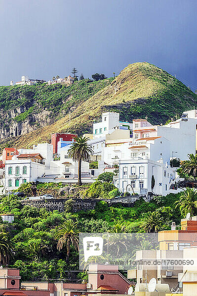 Residential buildings by mountain at La Palma  Santa Cruz  Canary Islands  Spain