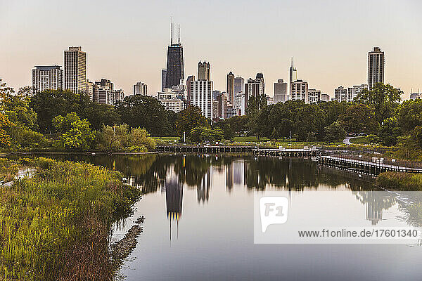 Reflection of cityscape on lake water Chicago  USA