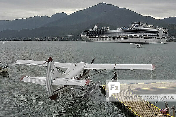 Float planes dock to board and carry tourists  then take off over cruise ships to sightsee glaciers  whales and bears. The Misty Fjords National Monument is one of the area’s major attractions; Alaska  United States of America