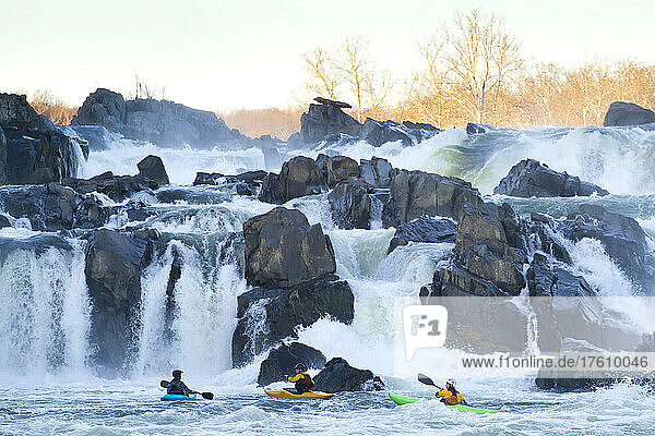 Kayakers running Great Falls of the Potomac River.; Great Falls  Maryland/Virginia.