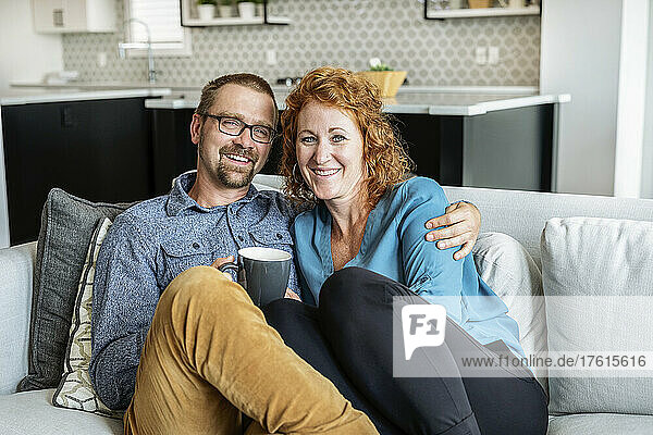 Portrait of a married couple at home; Edmonton  Alberta  Canada