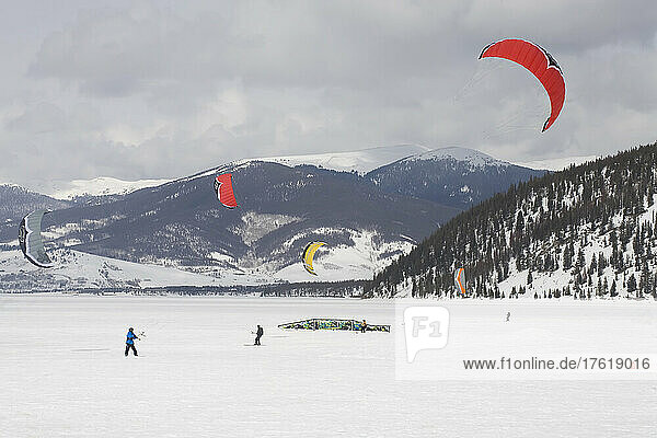 Kiteboarding on a frozen lake in winter.; Dillon Reservoir- Dillon  Colorado  USA