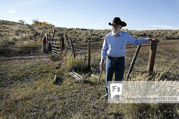 Rancher checking fence at Ladder Livestock Ranch in Wyoming  USA; Savery  Wyoming  United States of America