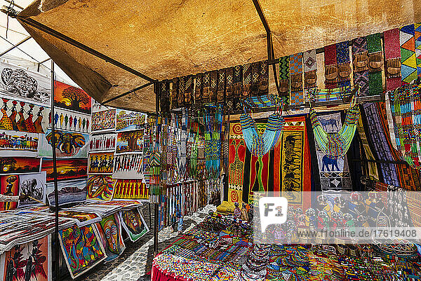 Cultural souvenirs on display in the market stall in Greenmarket Square in Cape Town; Cape Town  South Africa
