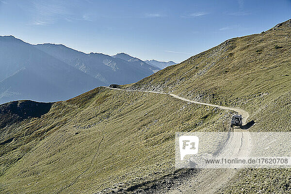 Off-road vehicle on gravel road  Colle dell'Assietta  Turin  Italy