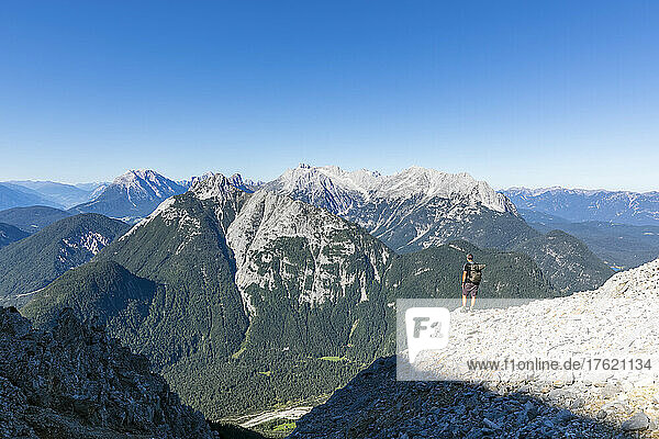 Male hiker admiring view of Grosse Arnspitze