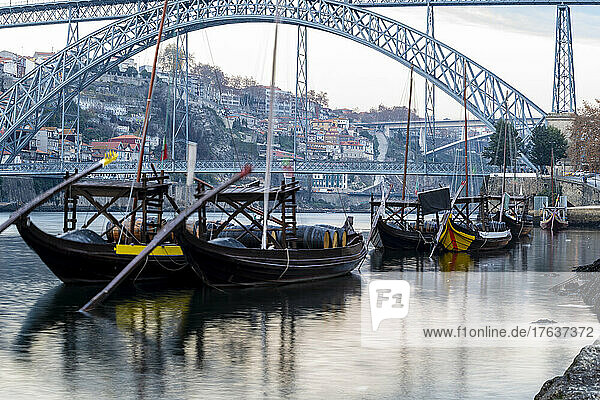 Portugal  Porto  Luis I Bridge and traditionalÊrabeloÊboats on Douro river
