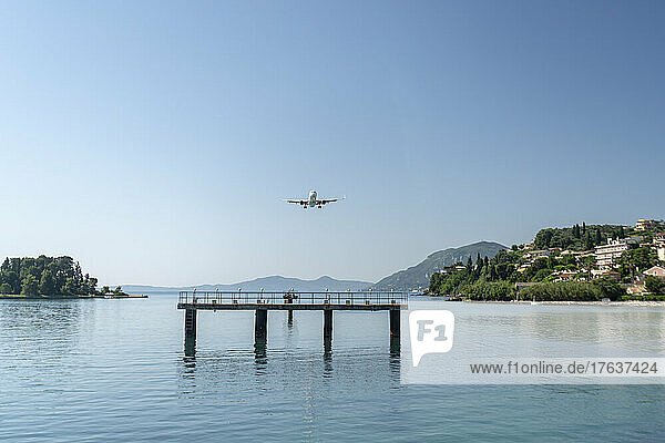 Greece  Corfu island  Airplane flying above sea