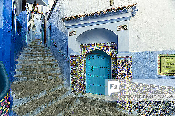 Morocco  Chefchaouen  Narrow steps and traditional blue house