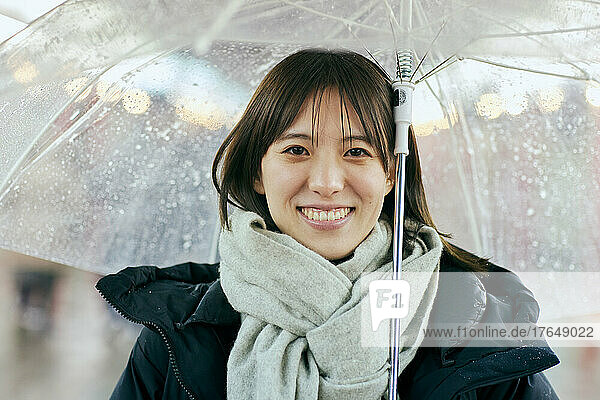 Portrait of young Japanese woman in the snow