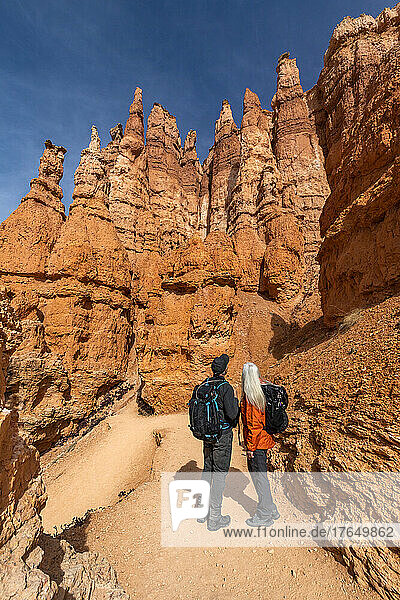 United States  Utah  Bryce Canyon National Park  Senior hiker couple exploring Bryce Canyon National Park