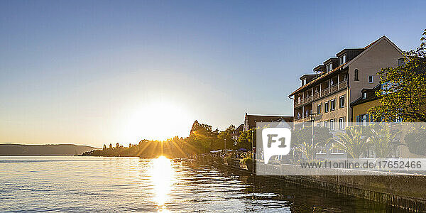 Germany  Baden-Wurttemberg  Uberlingen  Promenade stretching along shore of Lake Constance at sunset