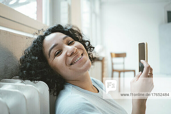 Happy beautiful woman with smart phone