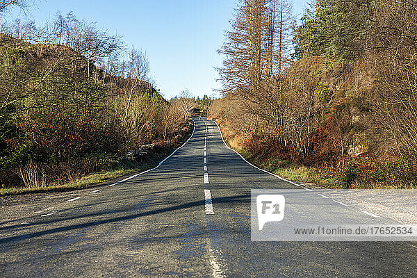 UK  Wales  Empty highway in Snowdonia National Park during autumn