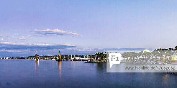 Germany  Baden-Wurttemberg  Konstanz  Panoramic view of Lake Constance and surrounding city at dusk