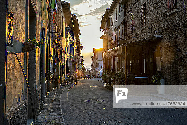 Italy  Province of Siena  Radicondoli  Old town alley at sunset