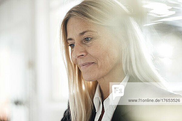 Blond businesswoman at work place