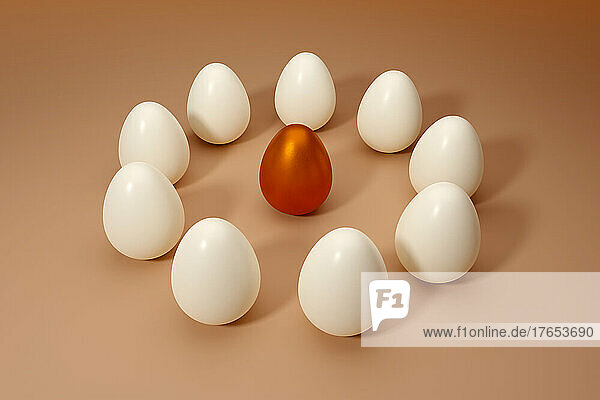Three dimensional render of orange metallic egg surrounded by white ones