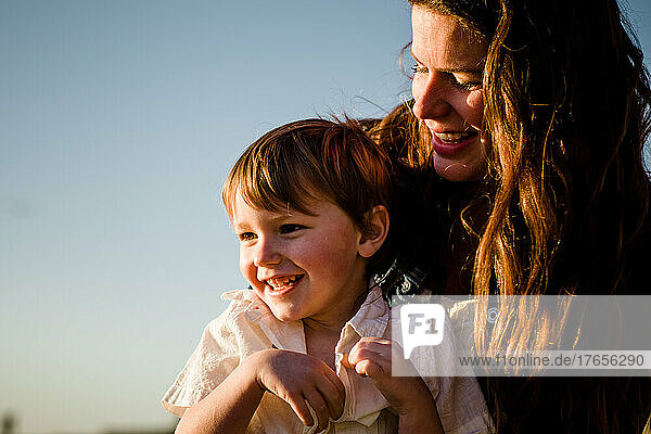 Close Up of Mother & Son on Beach at Sunset in San Diego