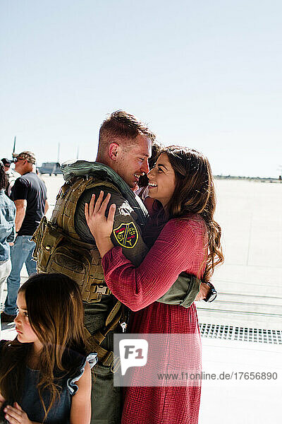Husband Greeting Wife at Military Homecoming in San Diego