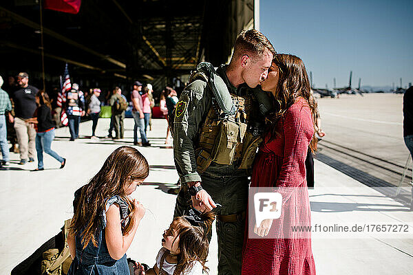 Marine Kissing Wife & Reuniting with Family in San Diego