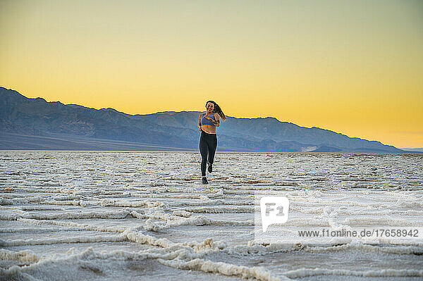 Female running at Badwater in Death Valley National Park