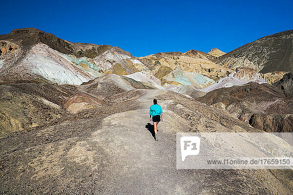 Female hiking at Artist Palette in Death Valley National Park