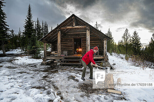 Chopping Wood at Snow Peak Cabin in Colville National Forest