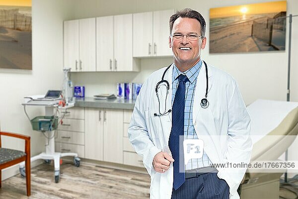 Caucasian male doctor standing in office