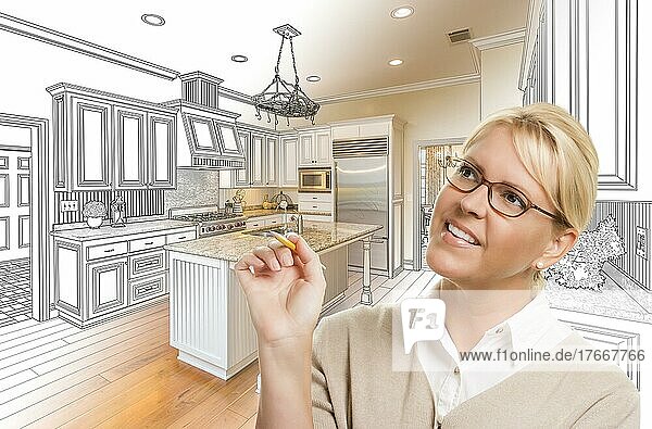 Creative woman with pencil over custom kitchen design drawing and photo combination