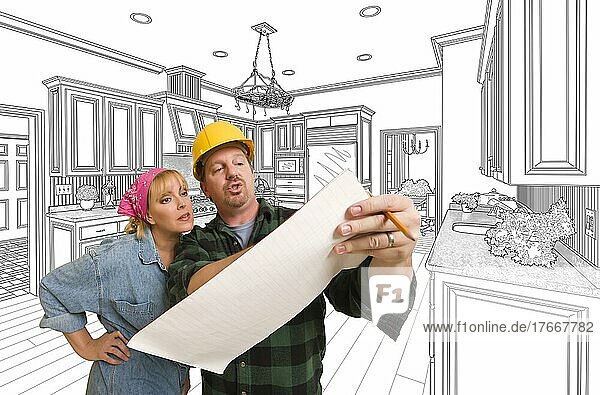 Male contractor in hard hat discussing plans with woman  kitchen drawing behind