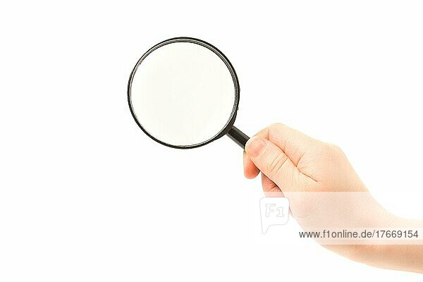 Woman hand holding magnifying glass before white background