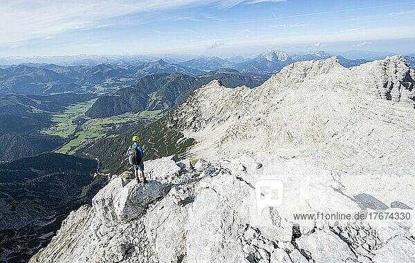 Hiker in rocky terrain  ascent to Mitterhorn  mountain panorama  rocky ridge at the back  Nuaracher Höhenweg  Loferer Steinberge  Tyrol  Austria  Europe