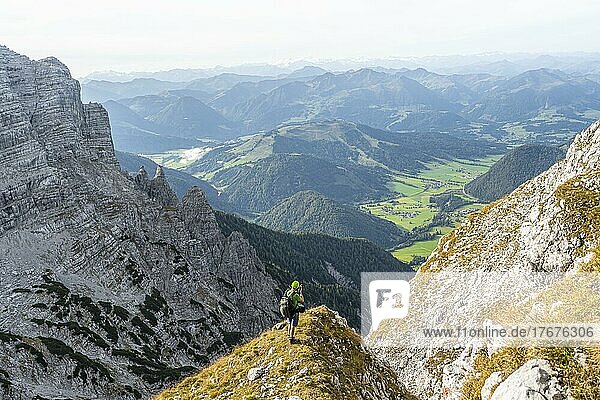 Hiker photographed climbing the Mitterhorn  Nuaracher Höhenweg  Loferer Steinberge  Tyrol  Austria  Europe
