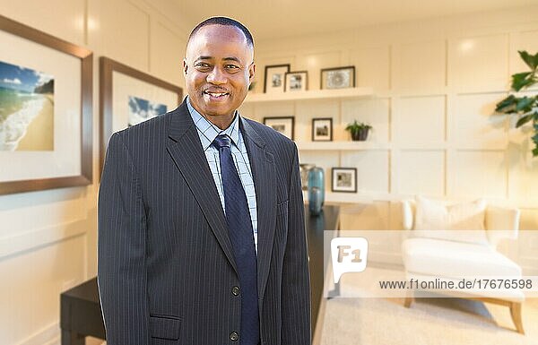 Handsome african american businessman inside his home office