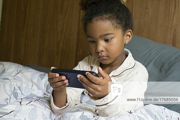 Girl looking at smart phone
