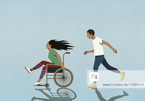 Man chasing carefree woman speeding in wheelchair