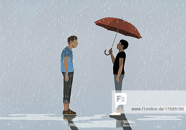 Man under umbrella face to face with man standing in rain