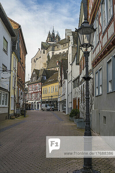 Germany  Rhineland-Palatinate  Diez  Empty town alley with Diez Castle in background