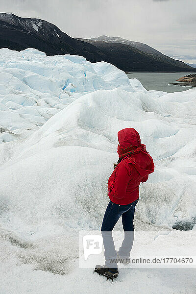 A Woman Hikes On Moreno Glacier  Los Glaciares National Park; Santa Cruz Province  Argentina