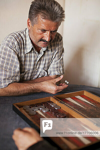 A Man Playing Backgammon; Urgup  Cappadocia  Turkey