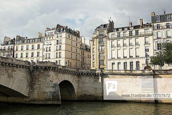 A view of the Paris cityscape and architecture from a Seine River boat cruise.; Paris  France