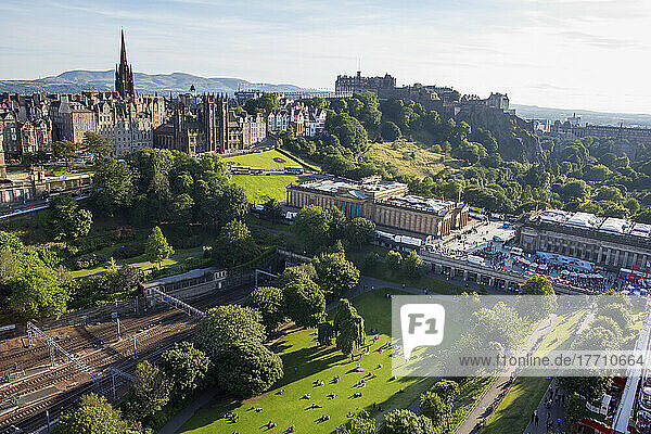 City goers sit in the Princes Street Gardens in downtown Edinburgh  Scotland; Edinburgh  Scotland