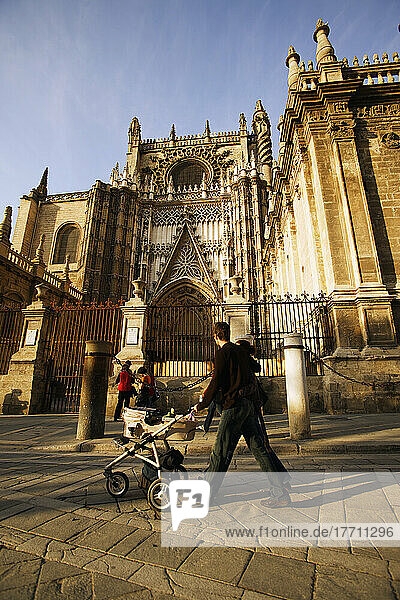 Seville  Spain. People Walking By Cathedral Gilrada