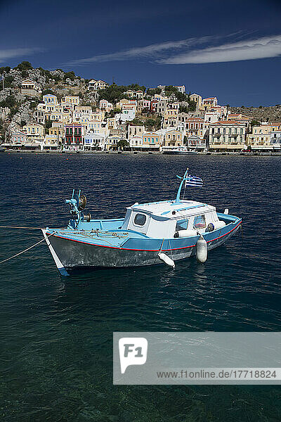 Fishing boat moored in Gialos Harbor  Symi (Simi) Island; Dodecanese Island Group  Greece