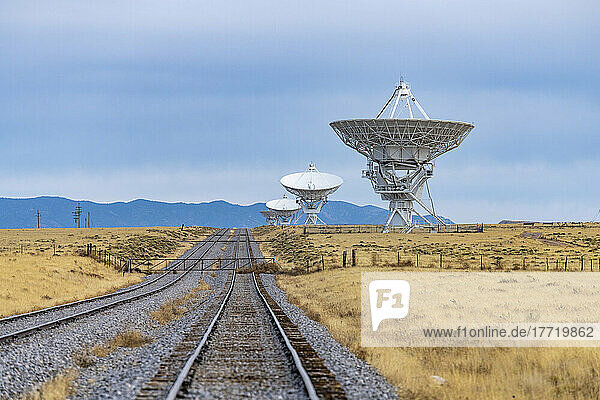 Some of the many Radio Telescopes around the National Radio Astronomy Observatory Very Large Array complex in New Mexico including the tracks used to move the dishes; Magdelena,  New Mexico,  United States of America